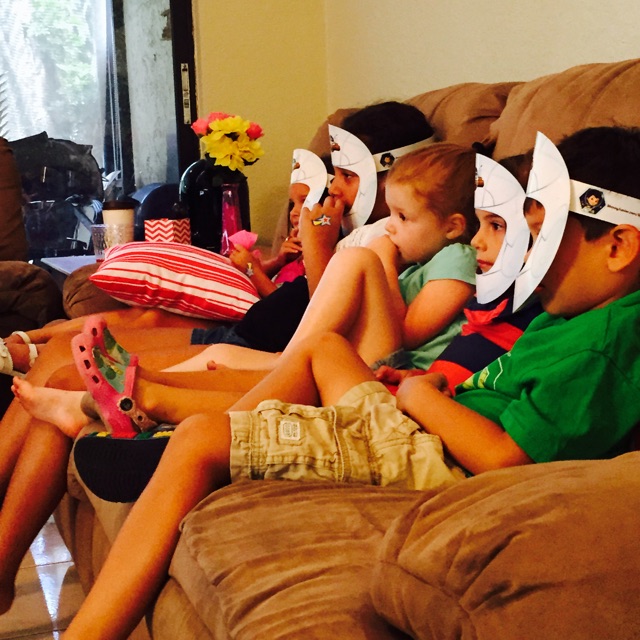 Watching Disney Junior Miles from Tomorrowland with helmets