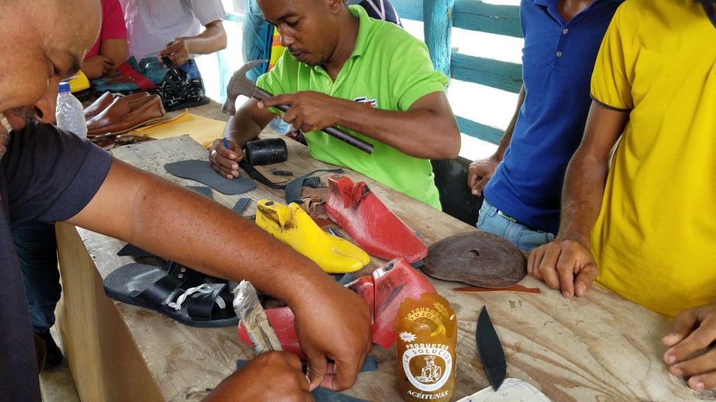 World Vision Shoemakers making shoes