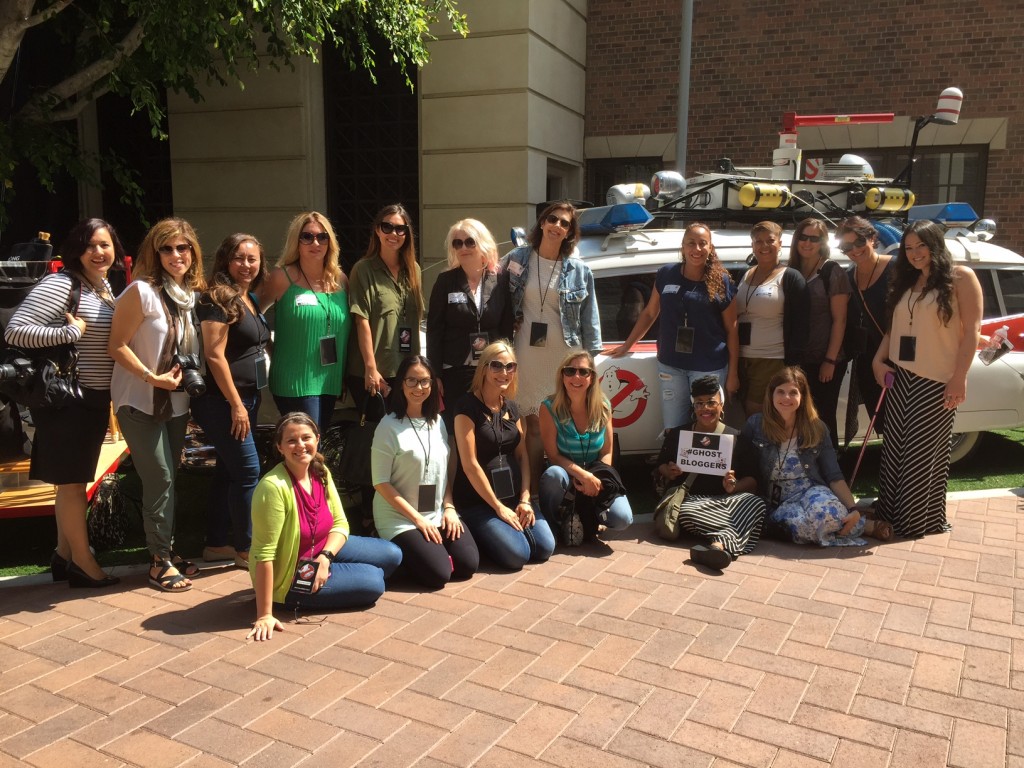 Group shot in front of the Ghostbusters Ecto-1