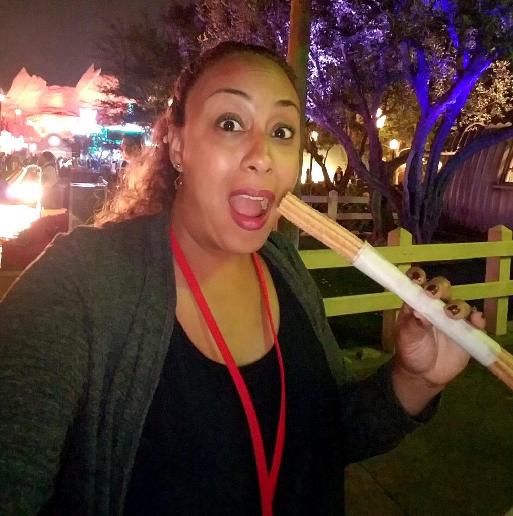 Eating a churro at the Cars 3 World Premiere
