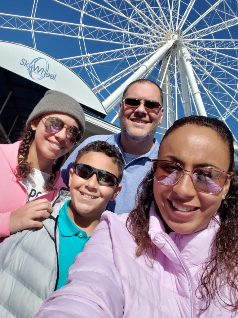 Family in front of SkyWheel