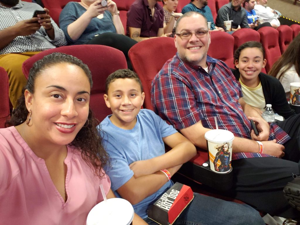 family waitching a movie