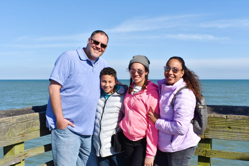 Family standing on a pier in Myrtle Beach