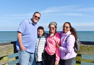 Family standing on a pier in Myrtle Beach