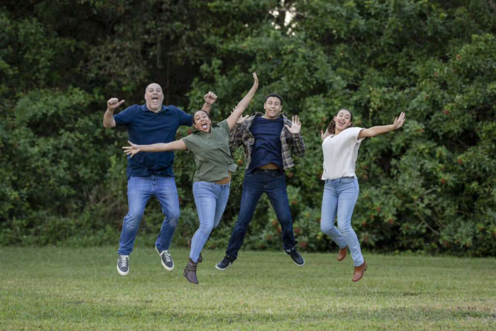 Leanette Fernandez and her family jumping